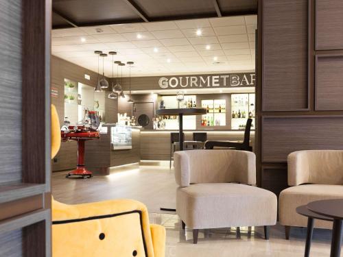 Bar/lounge, Novotel Brescia 2 in Brescia Bar/lounge, Novotel Brescia 2 in Brescia