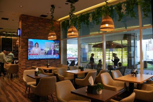 Restaurant, Treppan Hotel & Suites by Fakhruddin in Dubailand Restaurant, Treppan Hotel & Suites by Fakhruddin in Dubailand