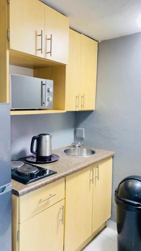 Kitchen, Rainbow Palace in Bloemfontein Kitchen, Rainbow Palace in Bloemfontein