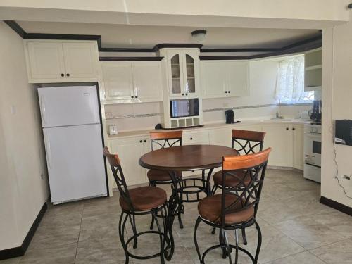 Kitchen, Welcome to our cozy retreat! in Oistins Kitchen, Welcome to our cozy retreat! in Oistins