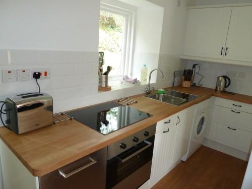 This photo about Bronfelin & Troed-y-Rhiw Holiday Cottage shared on HyHotel.com