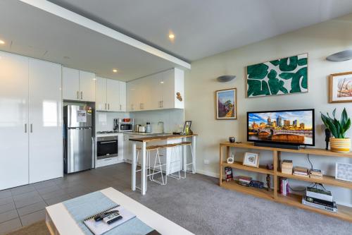 Kitchen, Urban Escape Steps to Restaurants, Bars & Trams by Custom Bnb Hosting in Brunswick Kitchen, Urban Escape Steps to Restaurants, Bars & Trams by Custom Bnb Hosting in Brunswick