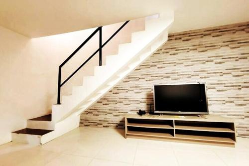 Shared lounge/TV area, Treasure Link Cooperative Society DECA CLARK Transient House Angeles City in Clark Freeport Zone Shared lounge/TV area, Treasure Link Cooperative Society DECA CLARK Transient House Angeles City in Clark Freeport Zone