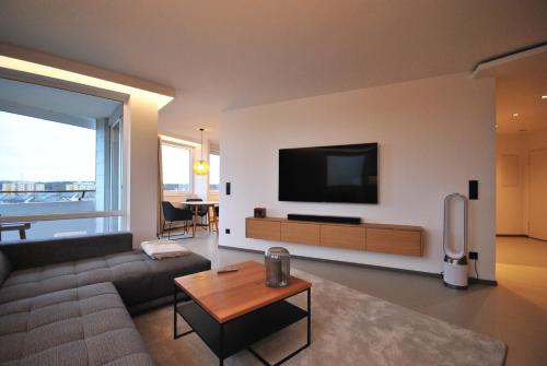 Közös társalgó / TV, Lakeview Design Apartment in Nordstadt Közös társalgó / TV, Lakeview Design Apartment in Nordstadt