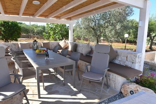 ระเบียง/ชานเรือน, Holiday home with pool Trulli dell"amore, Ostuni in ฟูมาโรลา ระเบียง/ชานเรือน, Holiday home with pool Trulli dell"amore, Ostuni in ฟูมาโรลา
