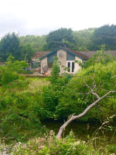 Canal Side Cottage,on the banks of the Caledonian Canal in Craig Dunain Canal Side Cottage,on the banks of the Caledonian Canal in Craig Dunain