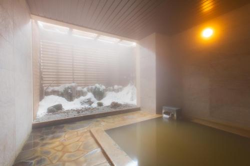 Hot spring bath, Chalet Ivy in Niseko Hot spring bath, Chalet Ivy in Niseko