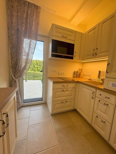 bucătărie, MARTINIHOF - Appartements mit Frühstück (MARTINIHOF - Appartements mit Fruhstuck) in Bad Tatzmannsdorf bucătărie, MARTINIHOF - Appartements mit Frühstück (MARTINIHOF - Appartements mit Fruhstuck) in Bad Tatzmannsdorf
