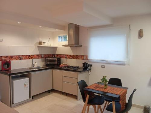 Kitchen, Prunus departamentos near General Enrique Mosconi International Airport Kitchen, Prunus departamentos near General Enrique Mosconi International Airport