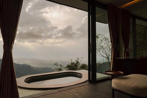 Hot tub, MAHHA dii MERRU Resort Puncak near Mount Puncak (Gunung Mas Tea Hills) Hot tub, MAHHA dii MERRU Resort Puncak near Mount Puncak (Gunung Mas Tea Hills)