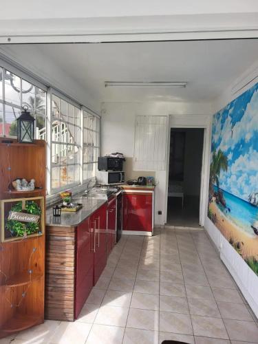 Kitchen, Appartement confortable a Sainte-Rose avec jardin et terrasse in Sainte Rose Kitchen, Appartement confortable a Sainte-Rose avec jardin et terrasse in Sainte Rose