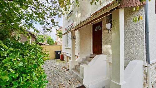 tuin, Chambre style hôtelière dans logement partagé, Le Pepsy Paris & Stade de France (Chambre style hoteliere dans logement partage, Le Pepsy Paris & Stade de France) in Epinay-sur-Seine tuin, Chambre style hôtelière dans logement partagé, Le Pepsy Paris & Stade de France (Chambre style hoteliere dans logement partage, Le Pepsy Paris & Stade de France) in Epinay-sur-Seine