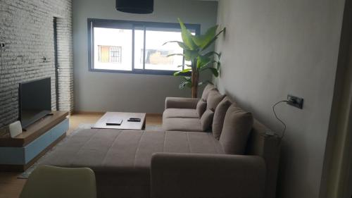 Shared lounge/TV area, Apartment rent for day agadir in El Houda Shared lounge/TV area, Apartment rent for day agadir in El Houda