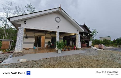 HOMESTAY BANGLO 2 BILIk DI TOBIAR PENDANG in Pendang HOMESTAY BANGLO 2 BILIk DI TOBIAR PENDANG in Pendang