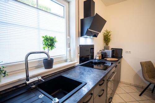 Cocina, Panorama am Fluss - Traum Quartier Apartments in Siegen Cocina, Panorama am Fluss - Traum Quartier Apartments in Siegen