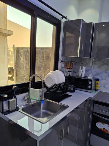 Seckebe Immo Et Business Studio Gris in Patte d'Oies Seckebe Immo Et Business Studio Gris in Patte d'Oies