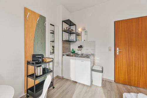кухня, Monteur Apartments Heilbronn City - LOW BUDGET, PARKING, WIFI, SMART TV NEW in Heilbronn кухня, Monteur Apartments Heilbronn City - LOW BUDGET, PARKING, WIFI, SMART TV NEW in Heilbronn