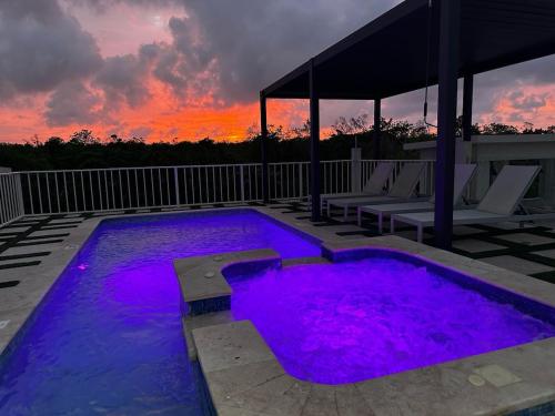 Sky Haven Retreat- 2BR Rooftop Pool, Stunning Views & Free Airport Pickup in Falmouth Sky Haven Retreat- 2BR Rooftop Pool, Stunning Views & Free Airport Pickup in Falmouth