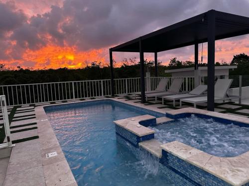 Skyline Retreat- Luxury Studio with Rooftop Pool, TV & AC in Falmouth Skyline Retreat- Luxury Studio with Rooftop Pool, TV & AC in Falmouth