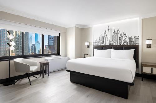 The Manhattan At Times Square By IHG in New York (NY) The Manhattan At Times Square By IHG in New York (NY)
