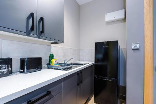Kitchen, Stylish 2 Bedroom Apartment in Central Wigan by MDGC Developments Ideal For Weekends Away and Busine in Wigan Kitchen, Stylish 2 Bedroom Apartment in Central Wigan by MDGC Developments Ideal For Weekends Away and Busine in Wigan