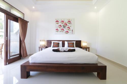 This photo about Putra Bisma Guesthouse shared on HyHotel.com