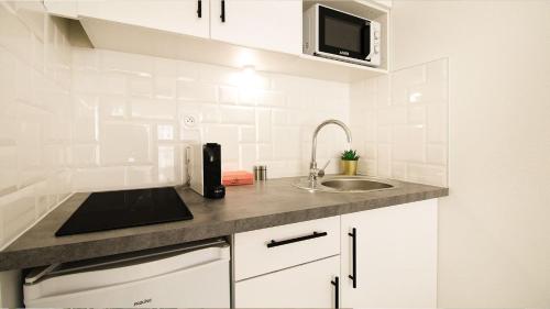 Cocina, HOMEY PURITY / NEW / Parking gratuit / Proche Tram / Aux portes de Genève (HOMEY PURITY / NEW / Parking gratuit / Proche Tram / Aux portes de Geneve) in Ambilly Cocina, HOMEY PURITY / NEW / Parking gratuit / Proche Tram / Aux portes de Genève (HOMEY PURITY / NEW / Parking gratuit / Proche Tram / Aux portes de Geneve) in Ambilly