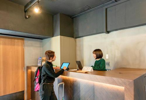 Hành lang, AND HOSTEL MINAMISENJU in Tokyo Hành lang, AND HOSTEL MINAMISENJU in Tokyo