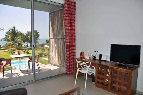 Balcony/terrace, Leo's Beach Hotel - Adults Only in Brufut Balcony/terrace, Leo's Beach Hotel - Adults Only in Brufut