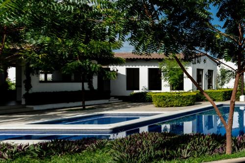 Плувен басейн, Casa 57 moderna y confortable en San Miguel in Jucuaran Плувен басейн, Casa 57 moderna y confortable en San Miguel in Jucuaran