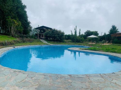 Piscina, Cotopaxi Rainforest Family Home in Zumbahua Piscina, Cotopaxi Rainforest Family Home in Zumbahua