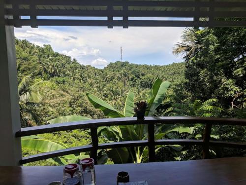 Puerto Galera Hilltop Guesthouse -Tropical Retreat in Palangan Puerto Galera Hilltop Guesthouse -Tropical Retreat in Palangan