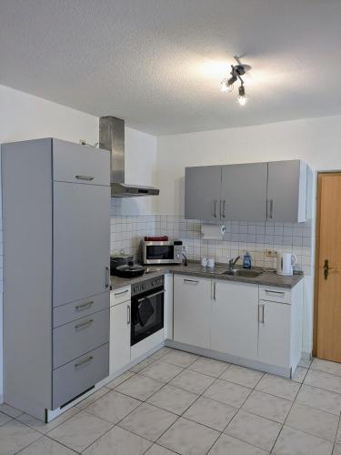 مطبخ, Helle und geräumige Ferien- und Monteurwohnung nur für Sie allein AUjvari Vermietungen (Helle und geraumige Ferien- und Monteurwohnung nur fur Sie allein AUjvari Vermietungen) in Spiegelberg مطبخ, Helle und geräumige Ferien- und Monteurwohnung nur für Sie allein AUjvari Vermietungen (Helle und geraumige Ferien- und Monteurwohnung nur fur Sie allein AUjvari Vermietungen) in Spiegelberg