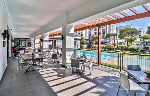 StayEase 3BR apartment with Pool Spa & Gym in Lethabong StayEase 3BR apartment with Pool Spa & Gym in Lethabong