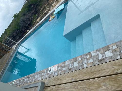 Uitzicht, Family Villa with Pool and steps to Secret Beach in Ambergris Caye Uitzicht, Family Villa with Pool and steps to Secret Beach in Ambergris Caye