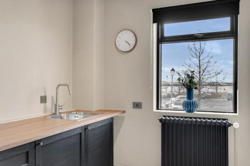 Kitchen, Newly renovated apartment by the sea in Hafnarfjorður in Hafnarfjordur Kitchen, Newly renovated apartment by the sea in Hafnarfjorður in Hafnarfjordur