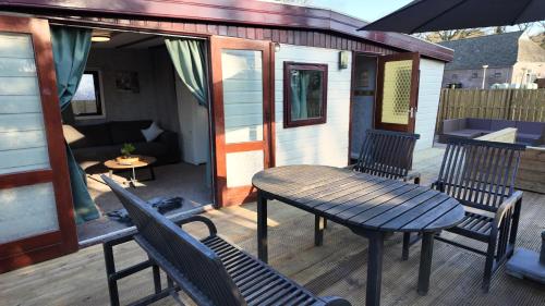 Balcony/terrace, Chalet Vuurvos - gelegen in Drenthe met prachtig wandel en fiets gebied in Eext Balcony/terrace, Chalet Vuurvos - gelegen in Drenthe met prachtig wandel en fiets gebied in Eext