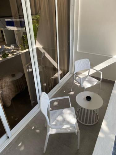 Balcony/terrace, New Garden Hotel near Baileys Restaurant Balcony/terrace, New Garden Hotel near Baileys Restaurant