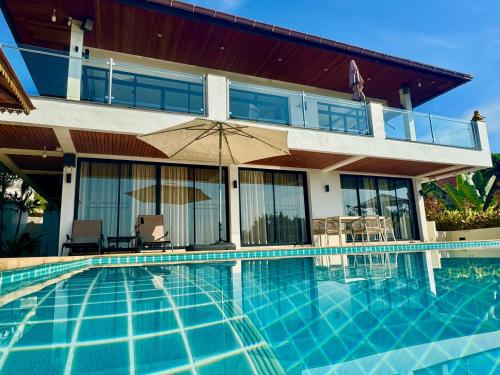 The Carma - stylish and luxury sea view pool villa