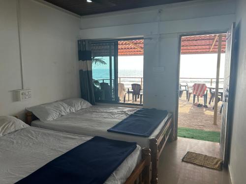 Candle wood Beach Stay in Gokarna Kudle Beach Candle wood Beach Stay in Gokarna Kudle Beach