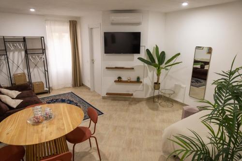 Shared lounge/TV area, Casa Cavour in Tarquinia Shared lounge/TV area, Casa Cavour in Tarquinia