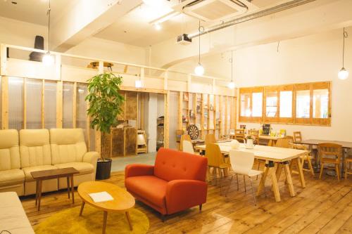 공용 라운지/TV 시청 구역, 게스트 하우스 마루야 (Guest House MARUYA) in 센트럴 아타미 공용 라운지/TV 시청 구역, 게스트 하우스 마루야 (Guest House MARUYA) in 센트럴 아타미