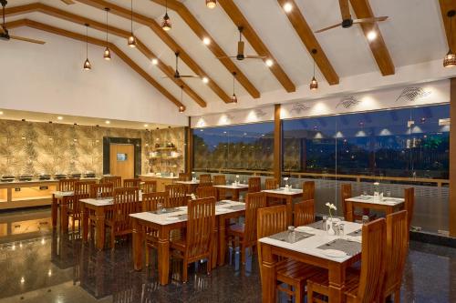 Étterem, Eve Munnar Luxury Resort and Spa in Anachal Étterem, Eve Munnar Luxury Resort and Spa in Anachal