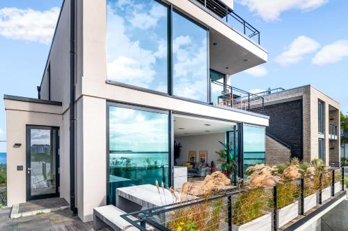 Balcony/terrace, Spimoev - Neues Designapartment mit Panoramablick auf Ostsee und Strand in Olpenitz Balcony/terrace, Spimoev - Neues Designapartment mit Panoramablick auf Ostsee und Strand in Olpenitz