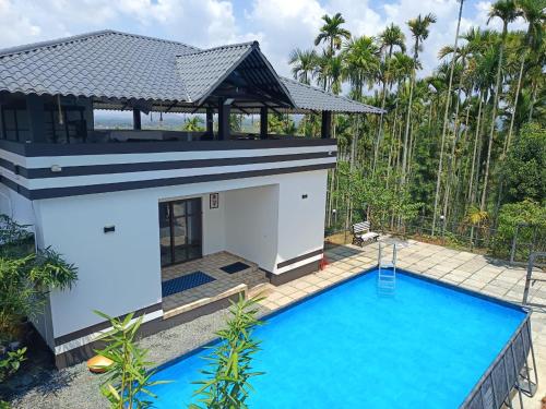 mountain lake view private pool villa -Wayanad in أمبالافايال mountain lake view private pool villa -Wayanad in أمبالافايال