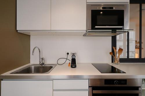 Kitchen, Appartement chill au cœur du Marais in Paris Kitchen, Appartement chill au cœur du Marais in Paris