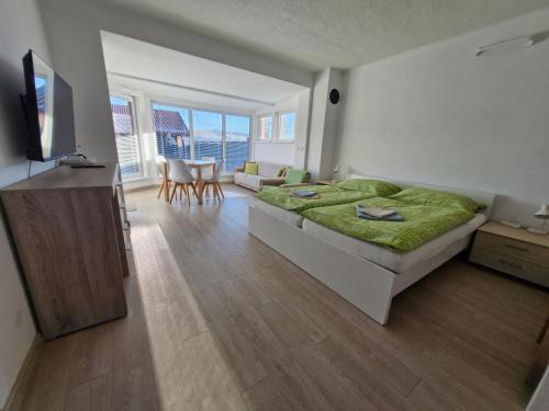 Közös társalgó / TV, Sarmir Apartmany in Bobrovec Közös társalgó / TV, Sarmir Apartmany in Bobrovec