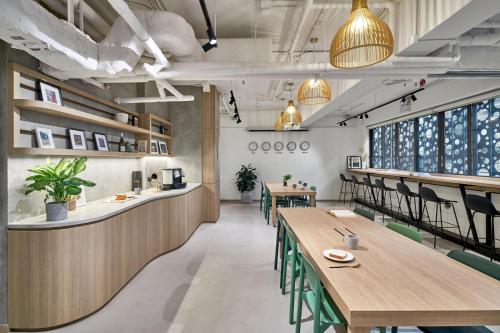 Shared lounge/TV area, Weave Studios – Kai Tak near Nan Lian Garden Shared lounge/TV area, Weave Studios – Kai Tak near Nan Lian Garden