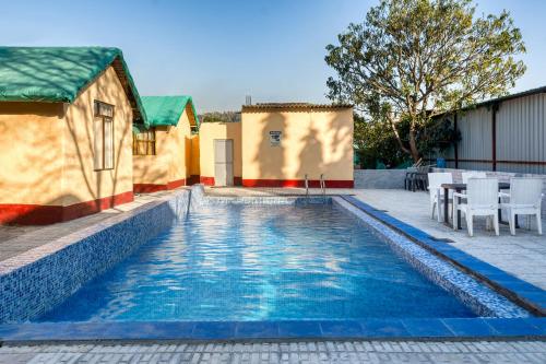 Úszómedence, The Wild Orchid Resort Corbett in Korbett Úszómedence, The Wild Orchid Resort Corbett in Korbett
