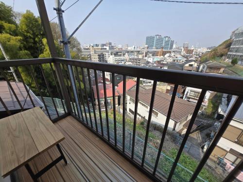 Balcony/terrace, Relaxing 石川町 サウナ付き一棟貸しの宿 in Yamate Balcony/terrace, Relaxing 石川町 サウナ付き一棟貸しの宿 in Yamate